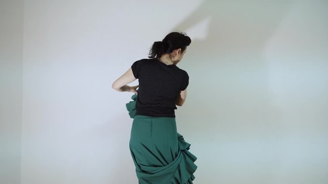 the girl dances flamenco, bata