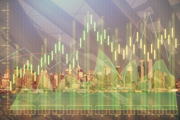 Financial graph on night city scape with tall buildings background double exposure. Analysis concept.