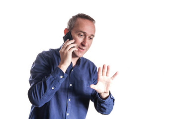 Man in casual blue shirt on white background holding emotional conversation