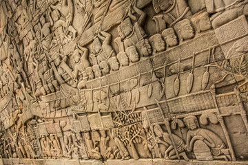 Fototapeta na wymiar Precious sculptures on the temple walls of Angkor Wat, Cambodia