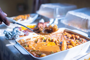 A serving of a curried beef gravy sauce 