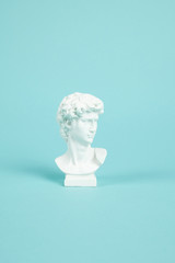 bust of David on a turquoise background