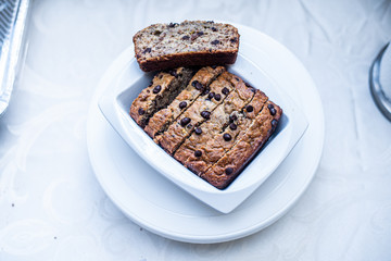 Slices of banana nut cake in a white plate