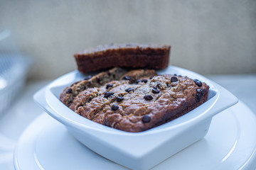 Slices of banana nut cake in a white plate