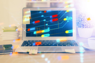 Technology theme drawing and table with computer. Double exposure. Concept of information.