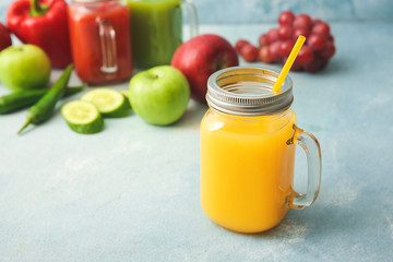 Mason jar of fresh juice on table