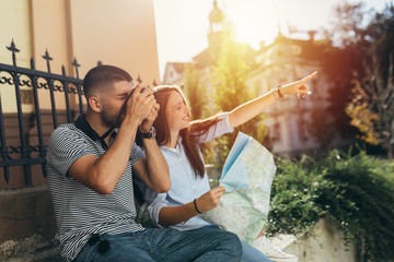 couple tourists outdoor in the city sightseeing