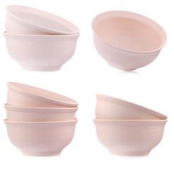 Simple clay bowl on white background. Traditional craft.