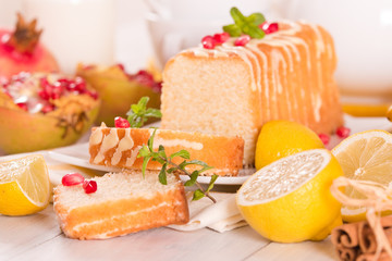 Lemon sponge cake with pomegranate.