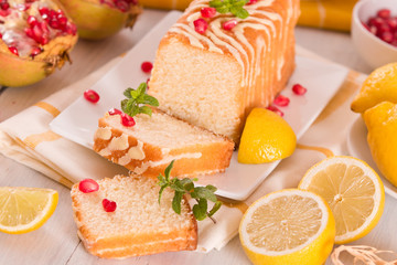 Lemon sponge cake with pomegranate.