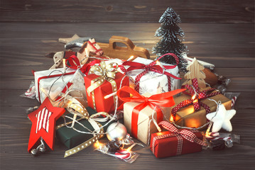 Christmas holiday decoration with gifts and ornaments. Background with copy space.