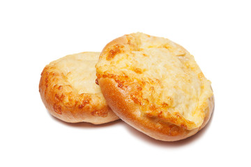 Two cheese buns on a white background