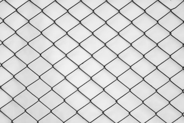 wire mesh of fence with plastic canvas background