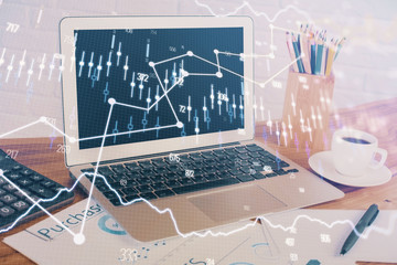 Forex market graph hologram and personal computer on background. Double exposure. Concept of investment.