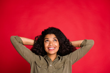 Photo of curly wavy cheerful positive nice pretty cute youngster looking up in search of interesing...