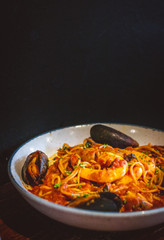 Seafood Slam pasta with Pomodoro, pasta, prawns, mussels, calamari in a bowl