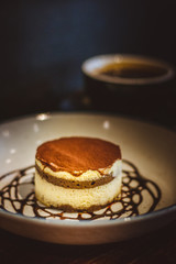 Tiramisu A rich treat blending the bold flavours of cocoa and espresso with mascarpone cheese and ladyfinger biscuits