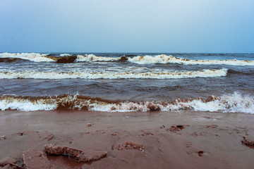 waves and splashes of cold water of a winter sea
