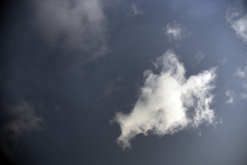 white clouds on black background.