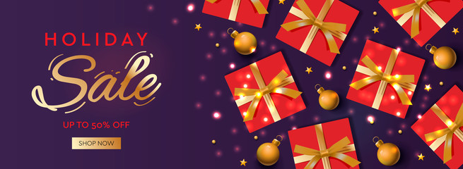Christmas horizontal banner, header for website. Holiday background, design with realistic gift boxes, bauble, and golden ball. New Year's gifts top view.