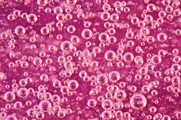 Small and Large Oxygen Bubbles in Pomegranate Liquid