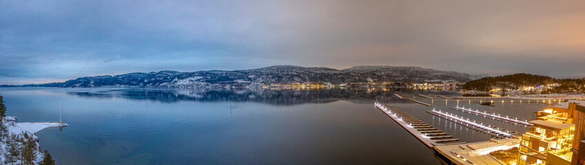 Fototapeta na wymiar Panorama of Sandefjord during winter day and night