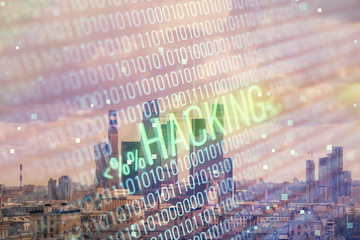 Double exposure of hacking theme drawing hologram on cityscape background. Concept of data cyber...