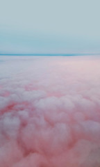 Pink cotton candy cloudscape background fluffy and soft, perfect for nursery backdrops, baby shower and little girls wallpapers.