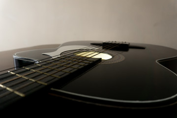 Fototapeta premium Black classic guitar in perpective