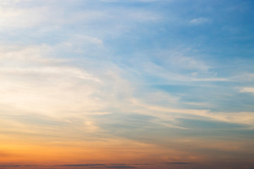 Evening light with clouds and blue sky.
