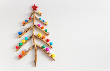 scrap DIY christmas tree on wooden background