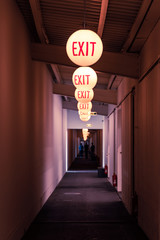 Long corridor plenty of exit sign