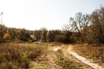 autumn river in a russian village