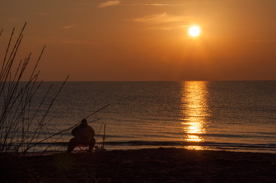 Fisheman At Sunrise