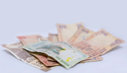 Closeup of brand new colorful Indian currency bank notes of 5 and 10, 20 rupees