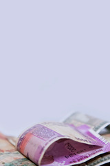 Close up of Indian 2000 rupee notes, Indian currency note Folded on white background with space for text