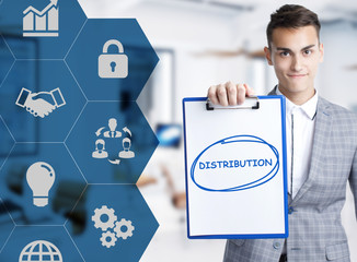 Business, technology, internet and network concept. Young businessman shows a keyword: Distribution