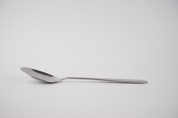 Closeup of an isolated spoon on white background