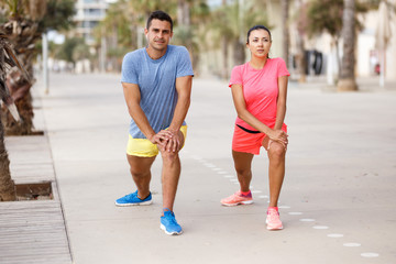 Couple training outdoors