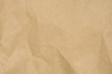 Fototapeta na wymiar Brown paper is crumpled texture background.
