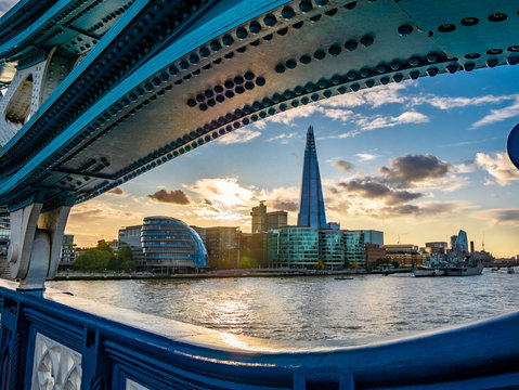 Cityscape of London with the famous landmarks on the riverside of Thames in sunset light