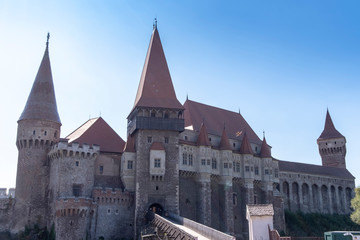 Fototapeta na wymiar Corvin Castle or Hunyadi Castle in Hunedoara, Romania in bright sunlight.