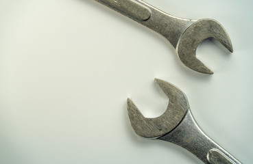 Industrial work spanner tools on white background.