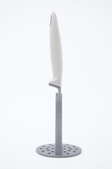 potato masher isolated on white background