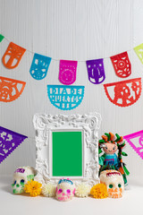 Day of the dead offering, Mexican ofrenda, sugar skulls, photo frame, green screen
