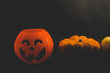 Halloween pumpkin on dark background with space for text