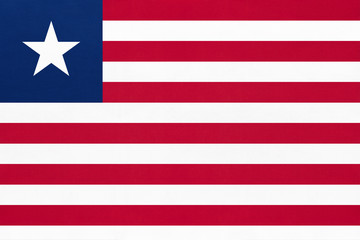 Republic Liberia national fabric flag textile background. Symbol of world african country.