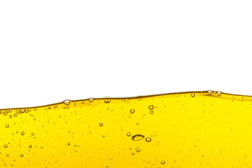 Beautiful wave of high viscosity of base oil and air bubble inside the oil isolated on white...
