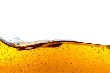 Beautiful wave of high viscosity of base oil and air bubble inside the oil isolated on white background, used as wallpaper, industrial concept
