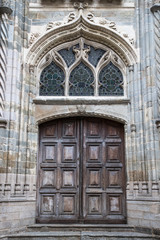 Fototapeta na wymiar Arched doorway design of old church in La Mayenne region of France